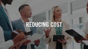 Group of people discussing a topic with 'Reducing Cost' overlaid in text