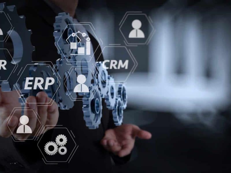 A man showing different Oracle Cloud Application Solutions on screen like ERP & CRM A man showing different Oracle Cloud Application Solutions on screen like ERP & CRM